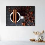 Leinwandbild Zimt auf einer Tasse Kaffee 100 x 70 cm