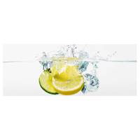 Glasbild Zitrone und Limette im Wasser