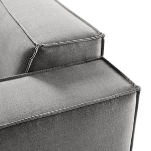 Canapé d’angle KINX ottomane Tissu - Tissu Milan : Gris clair - Méridienne longue à gauche (vue de face) - Avec réglage de la profondeur d'assise