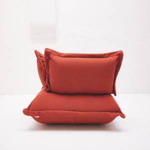 CUSHION Sessel Boucléstoff Rotbraun