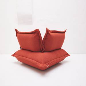 CUSHION Sessel Boucléstoff Rotbraun