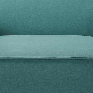 Canapé d’angle KINX ottomane Tissu - Tissu Osta: Pétrole - Méridienne longue à droite (vue de face) - Avec réglage de la profondeur d'assise