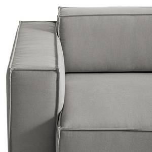 Canapé d’angle KINX ottomane Tissu - Tissu Osta: Marron gris - Méridienne longue à droite (vue de face) - Avec réglage de la profondeur d'assise