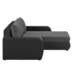 Ecksofa Huelva mit Schlaffunktion - Kunstleder/ Strukturstoff - Schwarz / Dunkelgrau - Longchair davorstehend rechts