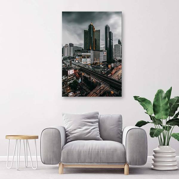 Canvas schilderij wolken boven de stad 80 x 120 cm
