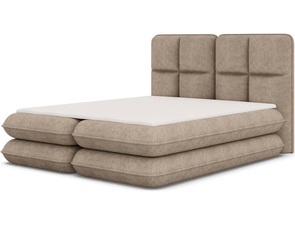 Box spring lit Stefan Marron café