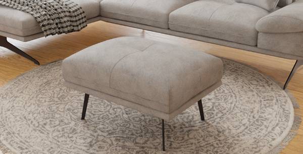 Gestoffeerde hocker Maja grijs