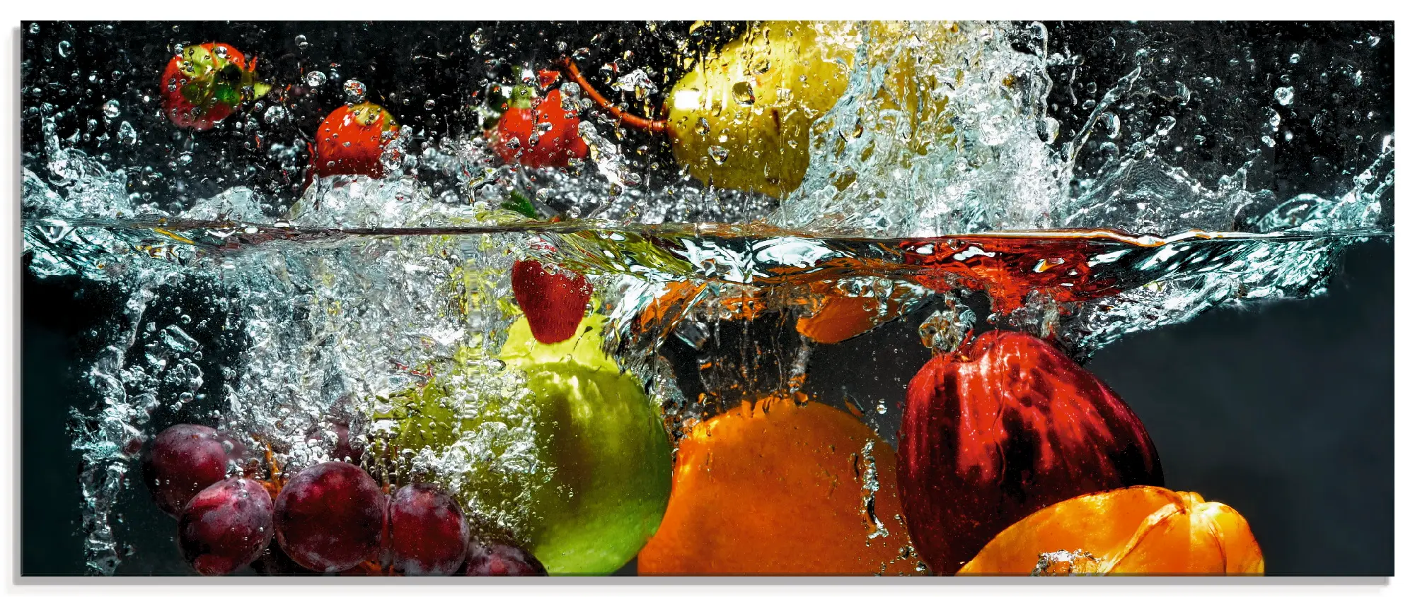 Glasbild Spritzendes Obst auf dem Wasser