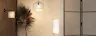Ensemble verschiedener Pendellampen und Leuchten im asiatisch inspirierten Design mit Japandi-Einflüssen aus Materialien wie Papier, Holz oder Bambusgeflecht.