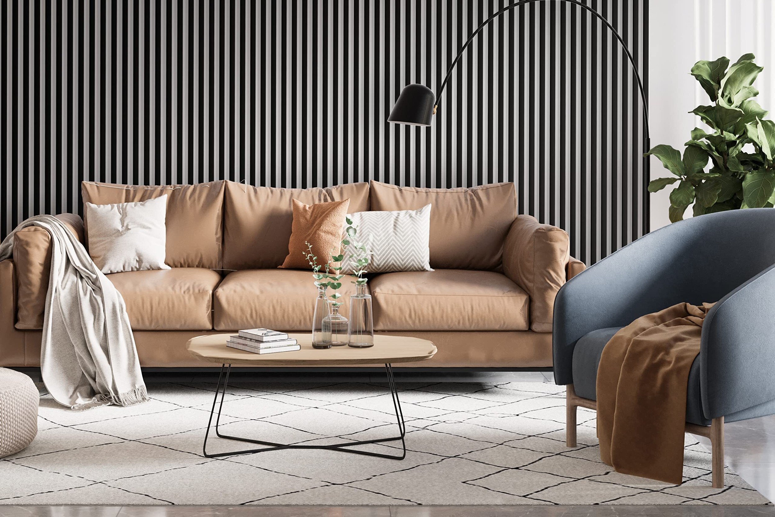 Sitzbereich mit Sofa und Sessel vor einer Wand mit Paneelen