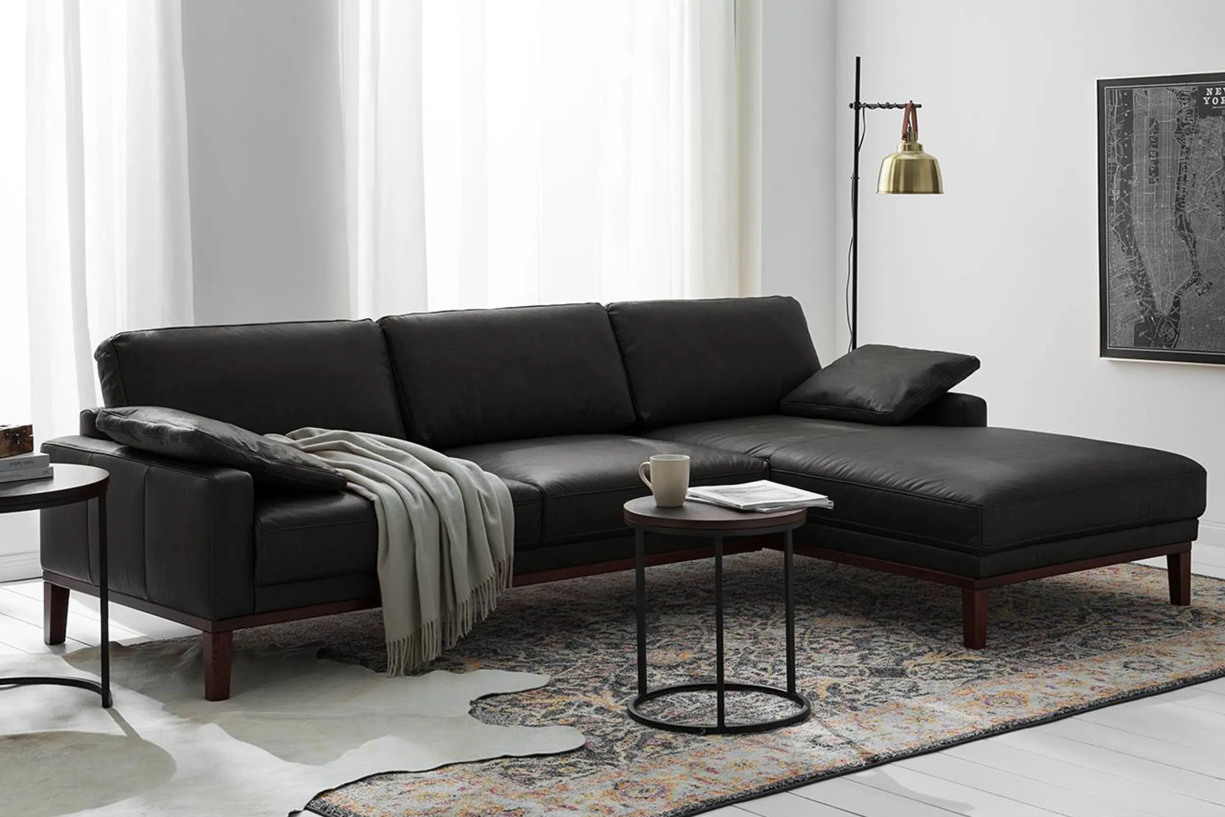 Elegantes Ecksofa aus schwarzem Leder