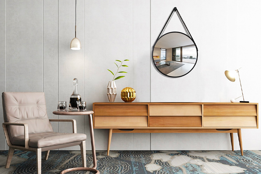 Runder Wandspiegel mit schlichtem, schwarzem Rahmen