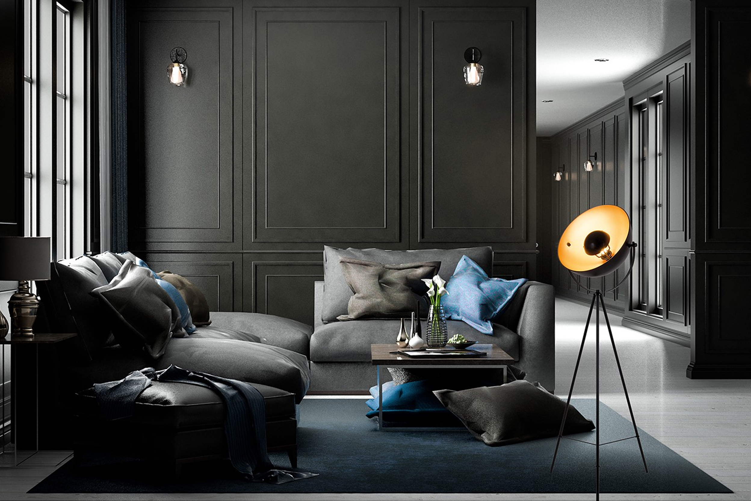 Grande pièce aux murs noirs avec grandes fenêtres, meubles gris foncés, coussins bleus, tapis gris et lampes noires
