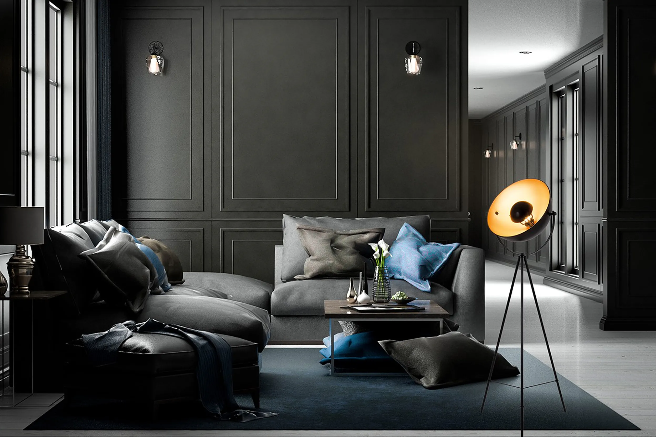 Grande pièce aux murs noirs avec grandes fenêtres, meubles gris foncés, coussins bleus, tapis gris et lampes noires